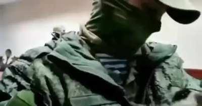 Our raccoon, which was stolen from Kherson, bites a russian propagandist 🦝