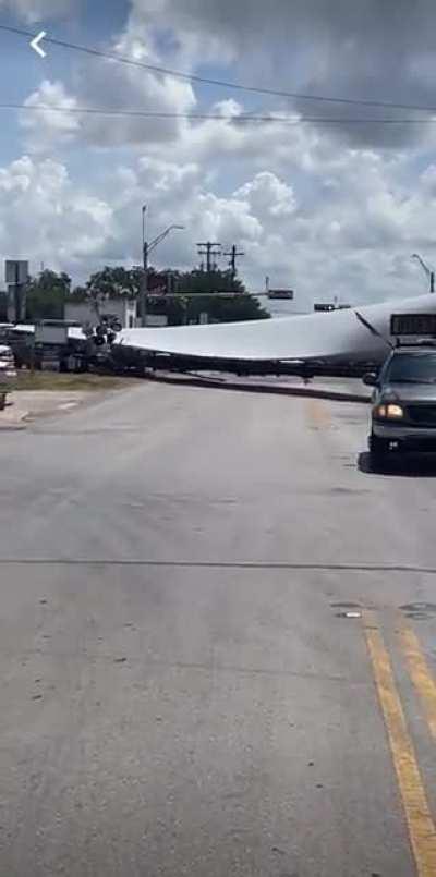 Train obliterates an oversized load stuck on tracks
