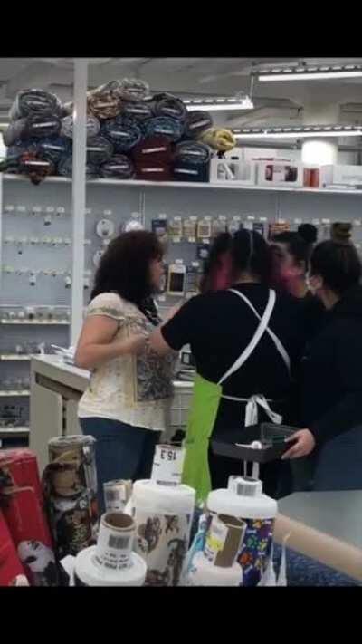Karen gets thrown out of a store while screaming “God Bless America”