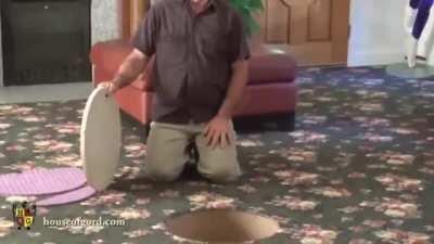 A guy with a hole in his living room