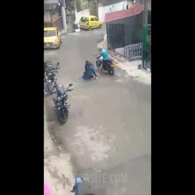 Man tries taking off with manhole cover and pays the price