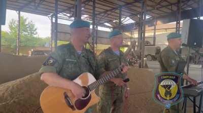 Ru pov: Video footage of a small military concert by VIA 