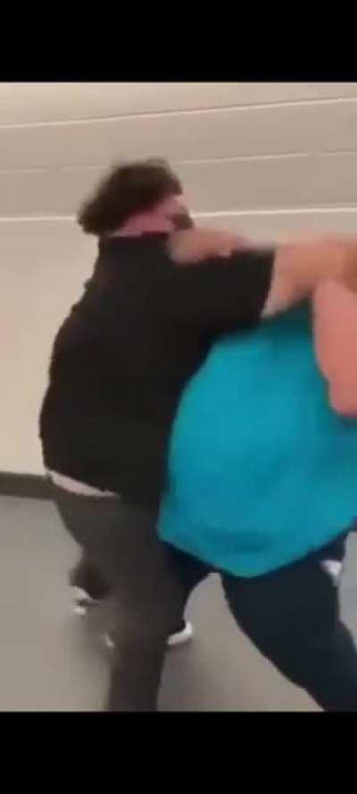 Fat kids fighting for a burger