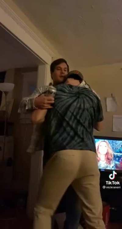 Guy smacks the hell out of his friend’s face with an unopened beer can