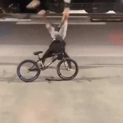 This acrobatic bike stunt looks impressive at first. I wonder if there was any chance of it working?