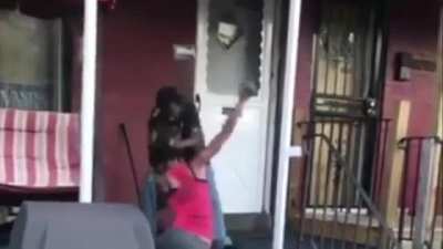 Dude puts his hands on a woman infront of her son.