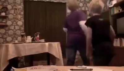 Kids doing tablecloth tricks