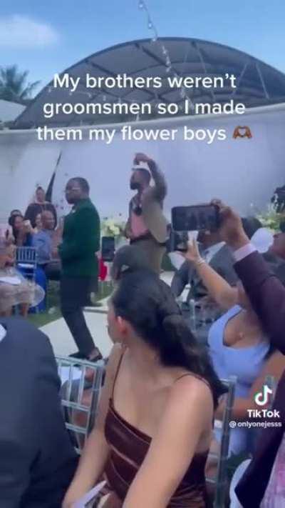 Brothers weren't groomsmen so she made them Flower Boys 🌸
