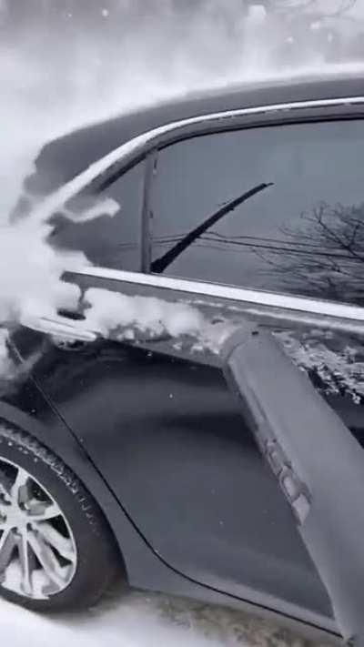 Removing snow with leaf blower (not mine)