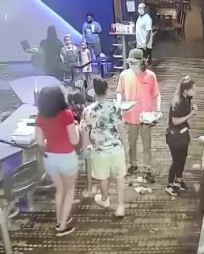 He dropped juice on her sneakers by mistake, she flips his whole tray.