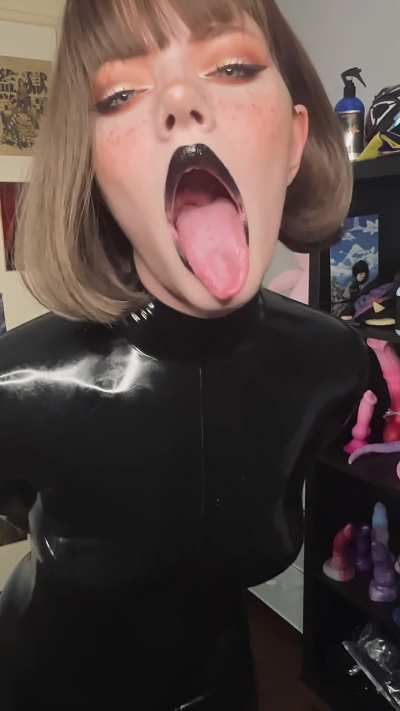 Will I seduce you with my tongue or my latex body?