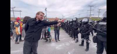 “Where are the children!? Where are they!? Find them! Bring them home!” Reverend David Black (who was previously shot in the face with a pepper ball by an ICE sniper) pleads with the line of local and state police supporting DHS, outside the Broadview, IL