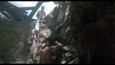 Erika Eleniak climbing out of a well - Chasers (1994) - 1080p
