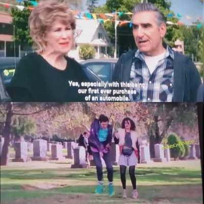 Johnny and Moira looking casual while car shopping.