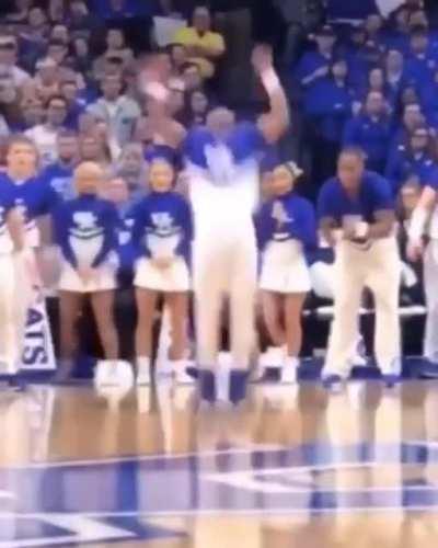 Kentucky cheerleader flips down the length of the basketball court
