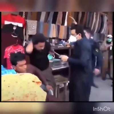 Journalist slapping people who are not wearing mask