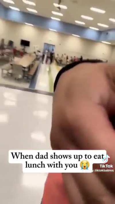 Surprising their kids at school lunch