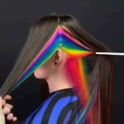 This rainbow hair coloring hidden under her natural hair