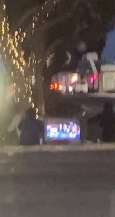 These dudes just playing video games on an intersection in City Heights. No big deal