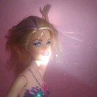 I love playing with my mermaids in colored bath bombs