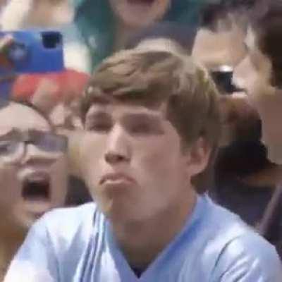 man is offered beetle