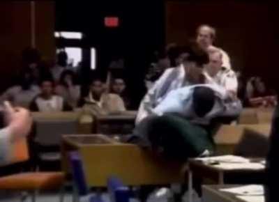 Man attacks his mother's killer in court.