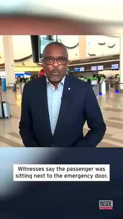 A passenger just opened the airplane door mid-flight