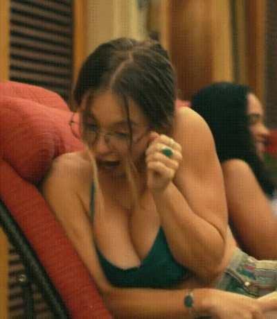 boobs squeezing up and also downwards. sydney Sweeney has the best boobs and she looks hot asf overall too. any man's dream gf.