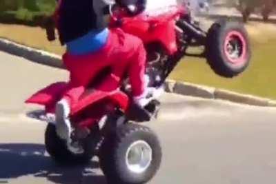 To wheelie a four wheeler