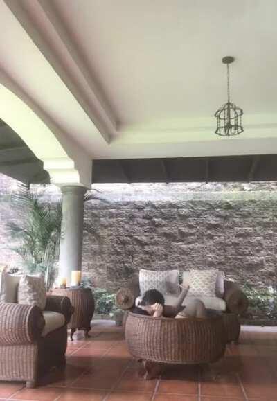 Sitting inside the table and then putting the lid on