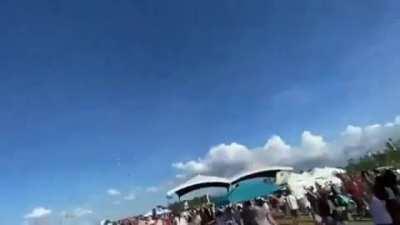 Little girl flung into the air during kite show comes out unscathed