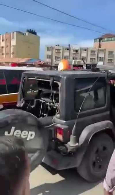 Hamas driving off a seized military Jeep with an Israeli captive straight to Gaza