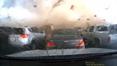 Tornado demolishing a shopping center