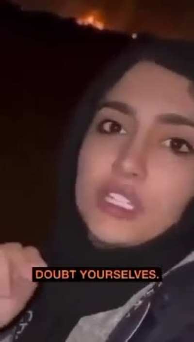 Iranian woman standing in front of massive inferno in Tehran lambasts diaspora for supporting US/Israel invasion