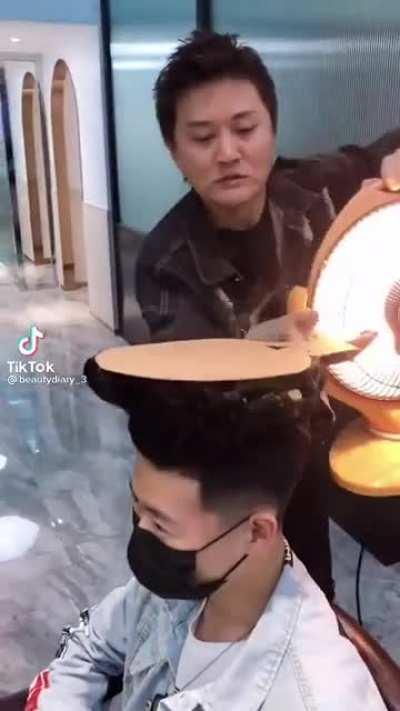 At least you can save money on popcorn at the theatre with this haircut