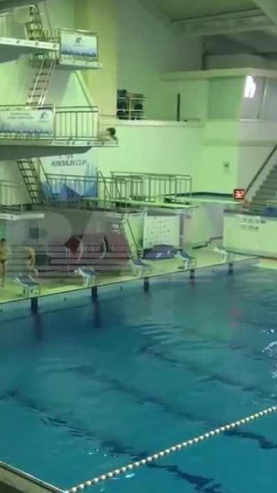 To do a somersault dive too close