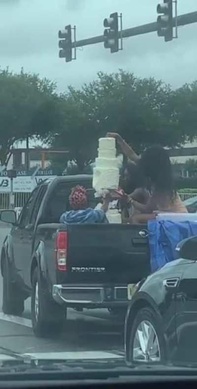 Just driving the wedding cake in the back of a pickup.