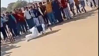 Former Aussie PM John Howard bowling to Indian MP