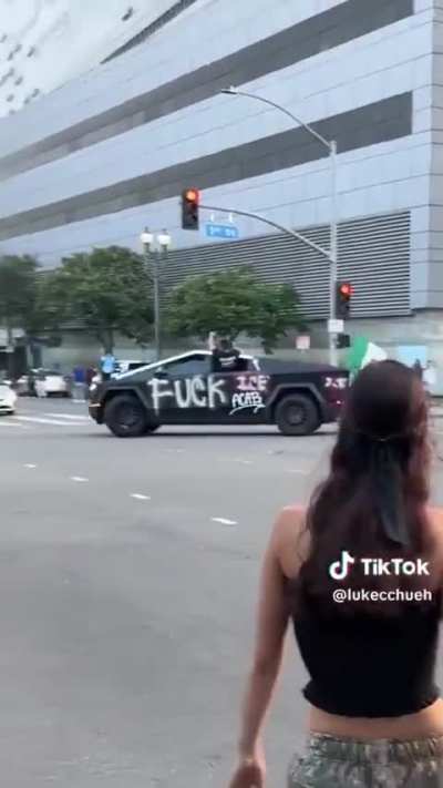 A Cybertruck carrying the Mexican flag drove around at the LA protest