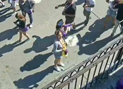 sexy and confident woman flashes boobs during mardi gras on earthcam