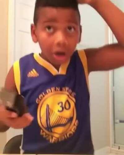 Kid tries to cut his own hair