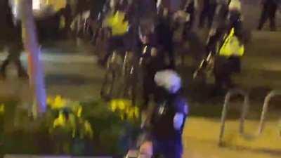 [Washington D.C] Police repeatedly targeting the counter protesters tonight while ignoring those participating in the 'maga March ', here they push the counter protesters away and shove them with their bikes as the protesters yell 