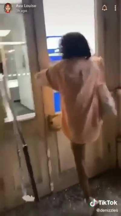 Instant karma for girl jumping through a smashed window