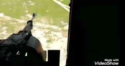 Iraqi door gunner firing at isis position southern of Al Ba’aj, 2020.[ 2 isis combatants were reportedly kia]