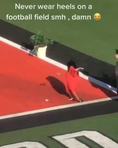 Walking with heels on a football field