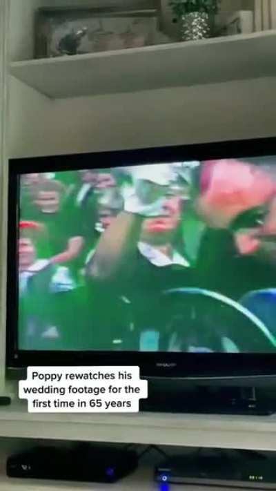 Watches movie taken from his wedding and honeymoon 65 years later