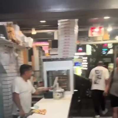 Pizza worker throws slice in the face of a unruly customer