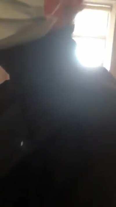 Police break into a house to arrest a man for failing to quarantine as per Covid regulations.