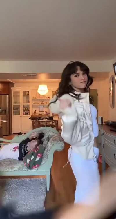 Two gorgeous bellies. Love the way the blonde’s shirt lifts