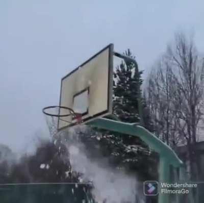 Shooting hoops with a snowball